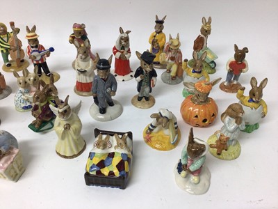 Lot 1156 - Twenty-nine Royal Doulton Bunnykins figures - Rainy Day, New Baby, Angel, Schoolmaster, Sailor, Gardener, Easter Parade, Judge, Easter Greetings, Bathtime, Businessman, Billie & Buntie, Stop Watch,...