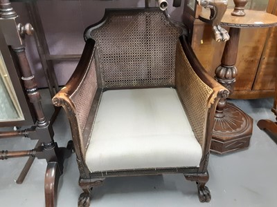 Lot 936 - Edwardian carved mahogany bergere sofa and armchair