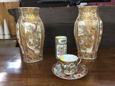 Lot 382 - Pair of Japanese Satsuma vases, cantonese famille rose vase of cylinderical form, together with a Japanese egg shell cup and saucer
