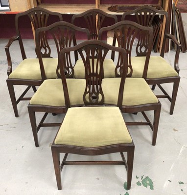 Lot 858 - Set of six George III style mahogany dining chairs, each with arched pierced back and slip in seat, to include a pair of carvers