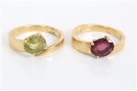 Lot 3275 - Two gold (stamped 750) gem set crossover rings...