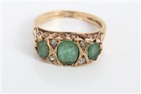 Lot 3276 - Gold (9ct) emerald and diamond ring with three...