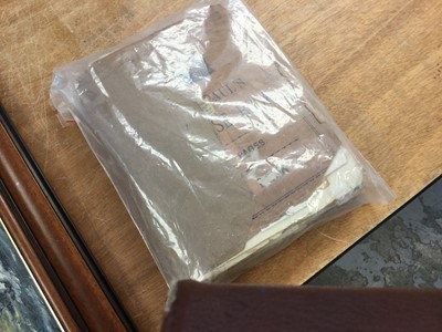 Lot 1554 - Early notebook containing World stamp selection, postal stationery and envelopes.
