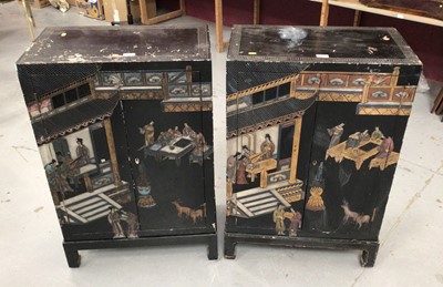 Lot 855 - Pair of Chinese black lacquered and chinoiserie decorated cabinets together with a consol table