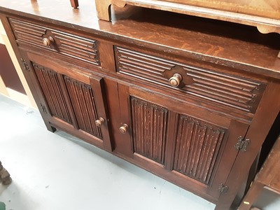 Lot 876 - 17th century style oak sideboard with linen fold panels