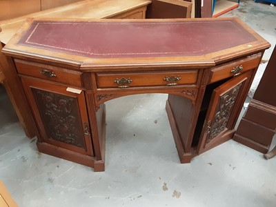 Lot 885 - Good quality late Victorian/Edwardian carved walnut kneehole desk with leather lined top, three drawers and two carved panelled doors below, 143cm wide, 61cm deep, 80cm high