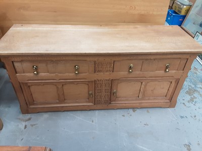 Lot 888 - Low oak sideboard with two drawers and two panelled doors below, 152cm wide, 51cm deep, 65.5cm high