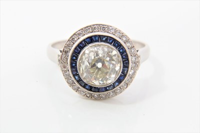 Lot 458 - Art Deco style diamond and sapphire halo cluster ring