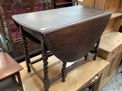 Lot 938 - 1930s oak drop leaf table on spiral twist supports
