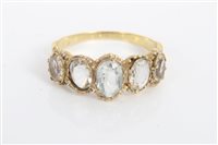 Lot 3285 - Aquamarine five stone ring with five oval...