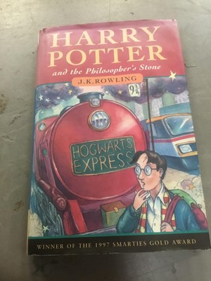 Lot 1682 - J K Rowling - Harry Potter and the Philosopher's Stone, signed by the author,  published by Bloomsbury, London, 1997 (sixteenth printing, with number string 20 19 18 17 16 to the copyright page, an...