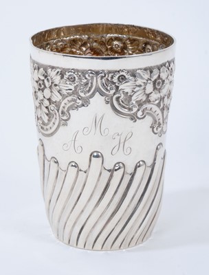 Lot 470 - Victorian silver beaker with half fluted and embossed floral decoration