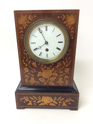 Lot 673 - Late 19th century French mantel clock in floral marquetry rosewood case, key and pendulum present, 32cm high