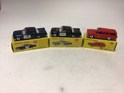 Lot 2215 - Dinky U.S.A. police Car No 258, R.C.M.P. Patrol Car No 264, Fire Chiefs Car No 257, all boxed (3)