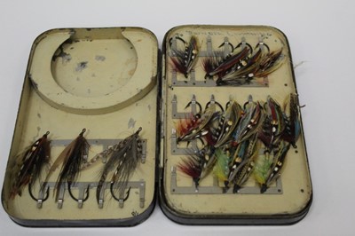 Lot 2365 - Group of Hardy fishing flies in black case together with related book (2)