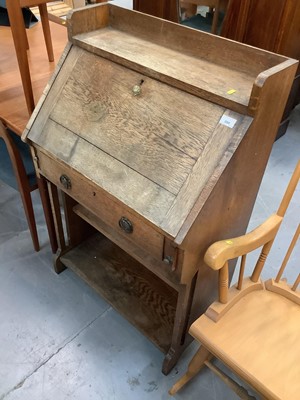 Lot 880 - Oak escritoire, mahogany coffee table, folding stool and a mahogany framed cheval mirror (4)