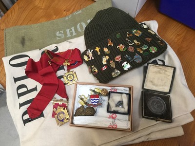 Lot 325 - Group of fishing medallions, Order of Buffalos medals, hat set with pin badge, military badges and others.
