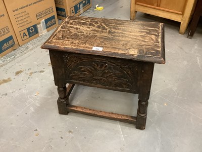 Lot 882 - Antique carved oak coffin stool with rising lid