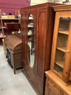 Lot 893 - Edwardian inlaid mahogany wardrobe with central oval mirrored door above a single drawer