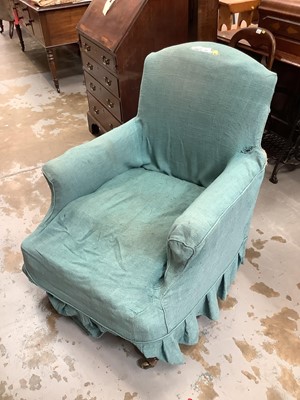 Lot 920 - 19th century arm chair with raised arched back, on simulated rosewood legs and brass castors stamped Cope & Collinson