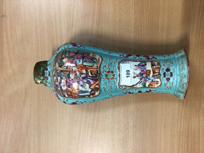 Lot 109 - Late eighteenth century Chinese export vase, circa 1780, with Mandarin pallette painted figure reserves on turquoise chicken-skin ground with floral sprays (neck broken), 26cm high
