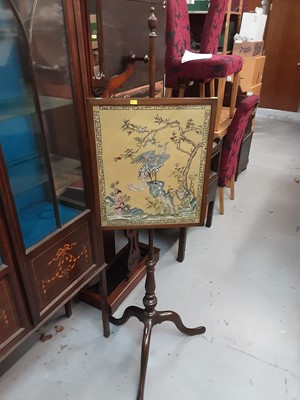 Lot 992 - Edwardian mahogany pole screen with needlework panel