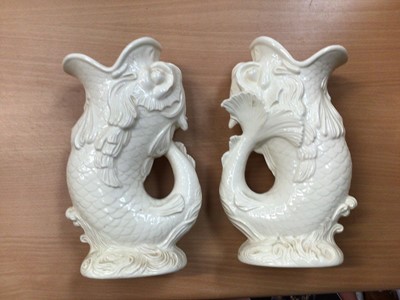 Lot 21 - Pair of Wedgwood cream glazed fish gluggle jugs