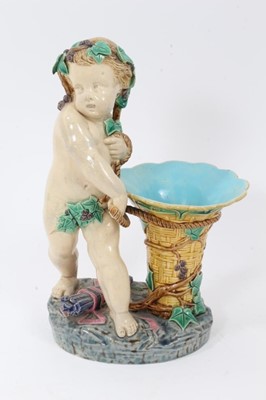 Lot 133 - Victorian Minton majolica glazed figural vase with a bacchanalian putti