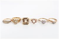 Lot 3209 - Group of six gold and yellow metal gem set...