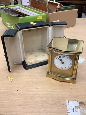 Lot 127 - Early 20th century French brass cased carriage clock with circular white enamel dial, in original leather covered case