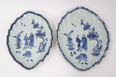 Lot 60 - Two 18th century Chinese blue and white leaf-shaped porcelain dishes, painted with figures