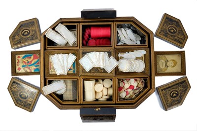 Lot 1938 - Fine early 19th Chinese lacquer games box containing fitted interior with games trays, a good collection of carved mother of pearl gaming counters each with carved crest and motto, ivory counters a...