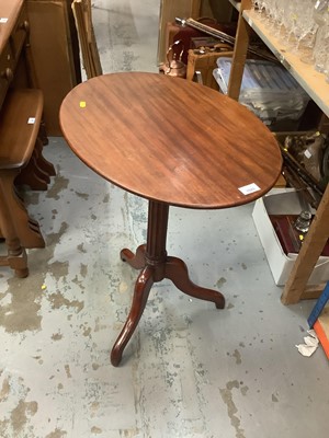 Lot 1023 - Mahogany wine table with oval top on fluted turned column and three hipped splayed legs