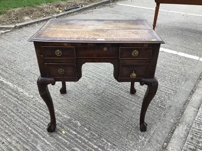 Lot 1035 - Antique oak lowboy with three drawers on cabriole legs withclawandballfeet, 75cm wide, 49cm deep, 69cm high