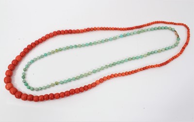 Lot 1995 - Coral bead necklace with a long string of graduated coral beads measuring approximately 5mm to 14mm, length 88cm, together with a turquoise bead necklace