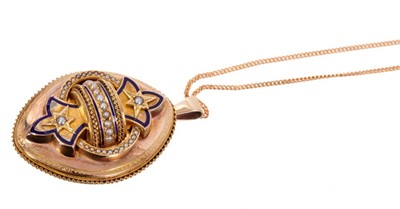 Lot 1985 - Victorian gold enamel and seed pearl pendant converted from a brooch, the oval plaque with applied gold blue enamel and seed pearls, rope twist edge and glazed locket compartment to the reverse, on...