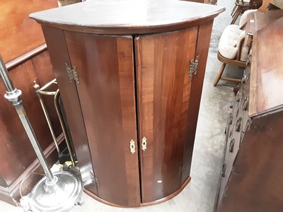 Lot 1048 - Georgian mahogany corner cupboard with shelved interior
