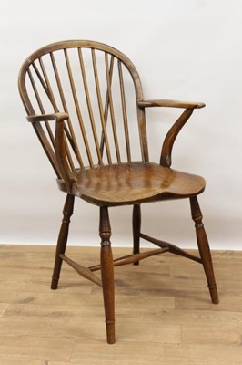 Lot 1410 - Mid 19th century elm and fruitwood stick back Windsor chair