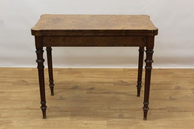 Lot 1399 - Rare Victorian burr walnut card table by Gillow & Co, rectangular fold over top with projecting angles, enclosing baize lined interior with dished corners, supported by pull out rear section, raise...