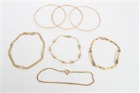 Lot 3291 - Four gold (18ct) bracelets and three yellow...