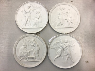 Lot 347 - Four white porcelain Royal Copenhagen circular plaques of classical style