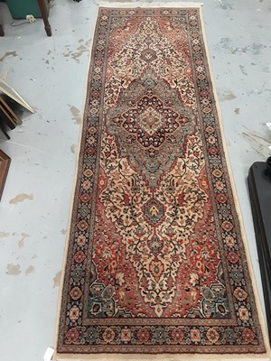 Lot 1091 - Eastern runner with geometric decoration on multi coloured ground, 232cm x 79cm