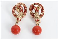 Lot 3294 - Pair gold (9ct) coiled snake earrings with red...