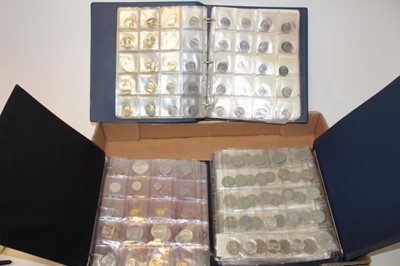 Lot 477 - World - Mixed coinage contained in three albums to include Austria Maria Theresa silver Thalers 1780 x 3 UNC