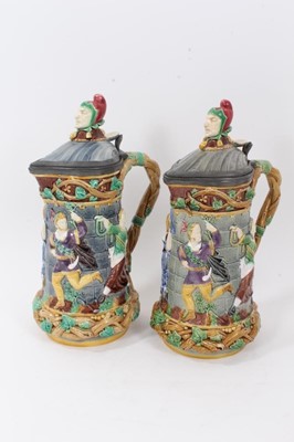 Lot 40 - A matched pair of Minton Majolica 'Tower' jugs, 1881 and 1883, 33cm height