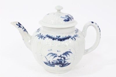 Lot 22 - Rare Worcester small strap-fluted teapot and cover, circa 1755, painted in blue with the Fisherman and Willow Pavilion pattern, workman's mark to base, 11cm high