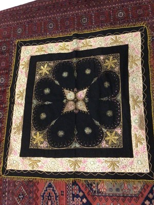 Lot 2109 - Box of textiles including black wool panel hand embroidered with metallic thread, four white work babies dresses/christening gowns and similar bodice.