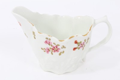 Lot 49 - Lowestoft ewer, circa 1790, of Low Chelsea form, polychrome painted with floral sprays, 5.75cm high