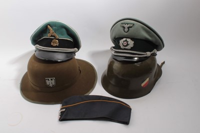Lot 735 - Group of 5 replica Nazi Officers caps, side caps and helmets to include a replica Afrika Korps helmet (5)