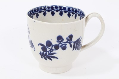 Lot 96 - Liverpool blue and white coffee cup, circa 1775, decorated with flowers on the outside and a foliate pattern on the inside rim, 6.5cm high